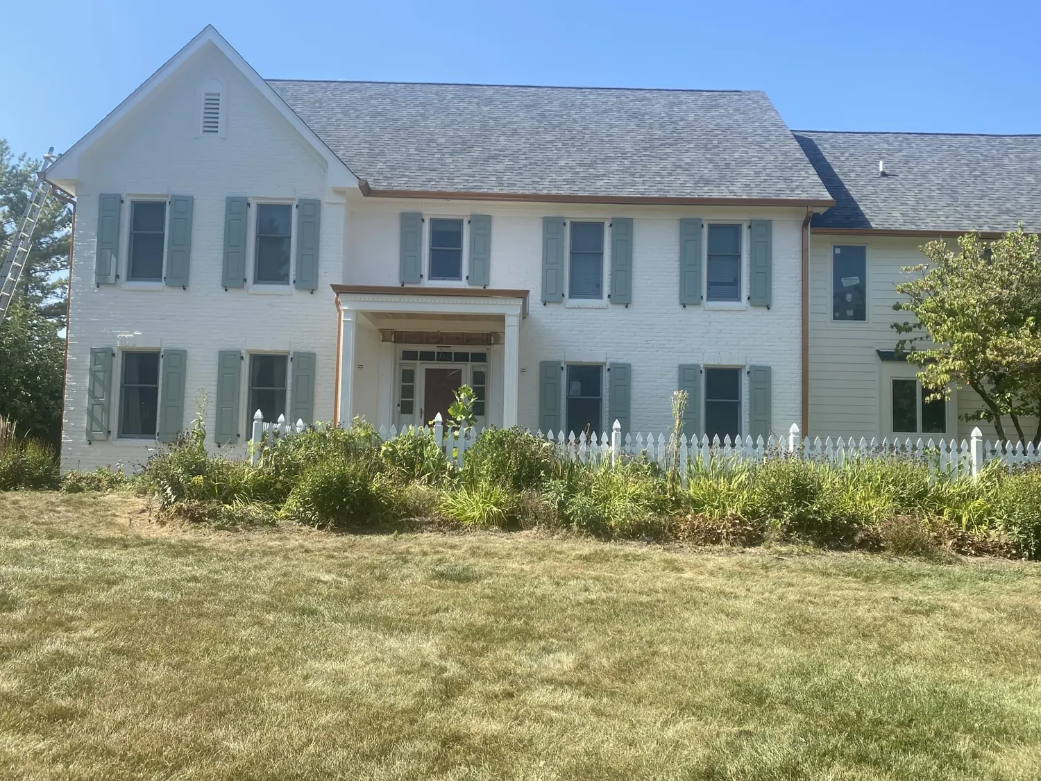 A home in the greater Indianapolis area with new seamless gutters installed by Two Men and a Gutter